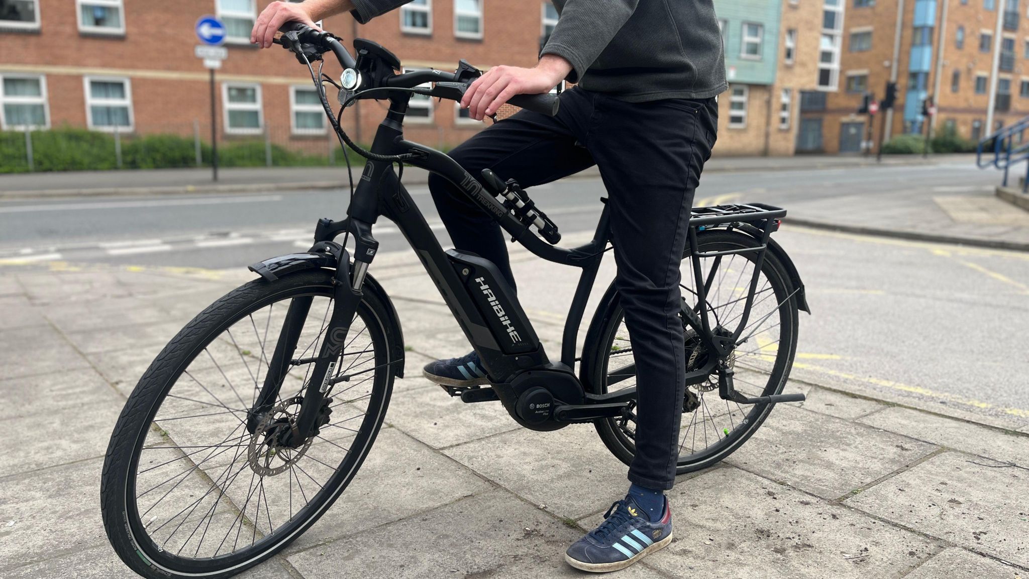 A generic photo of a person on an e-bike ebike e bike