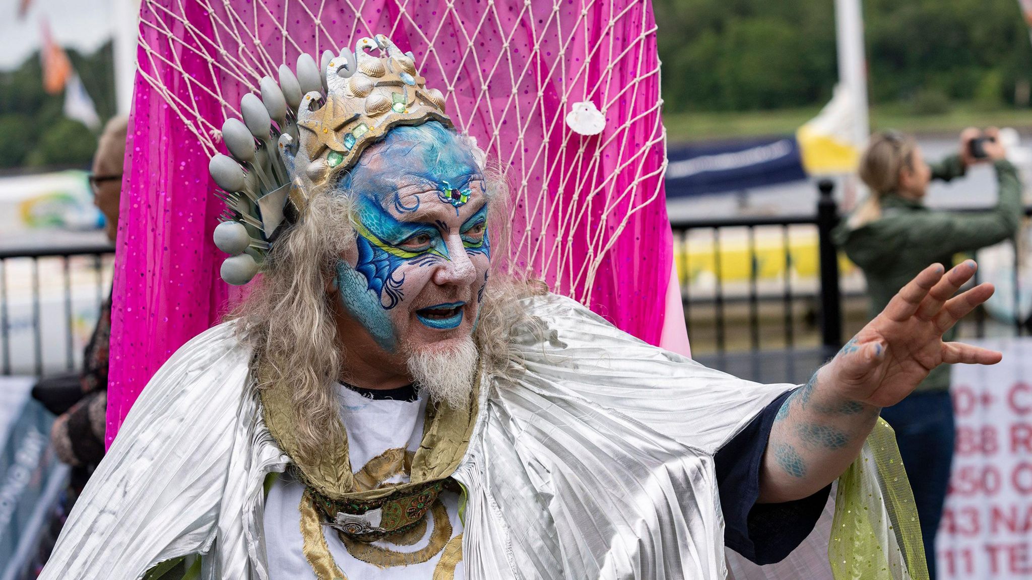 Man in god of the sea costume taking part in Derry's marime festival parade