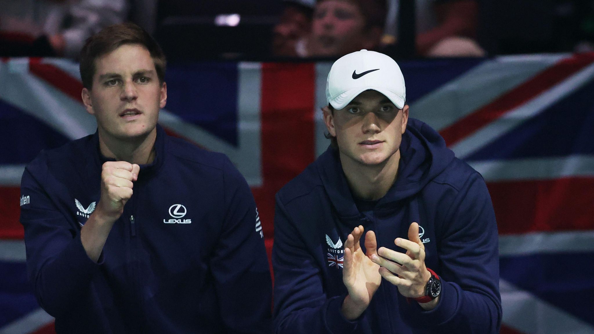 Henry Patten and Jack Draper cheer on their Great Britain team-mates at the Davis Cup tie against Finland in Manchester