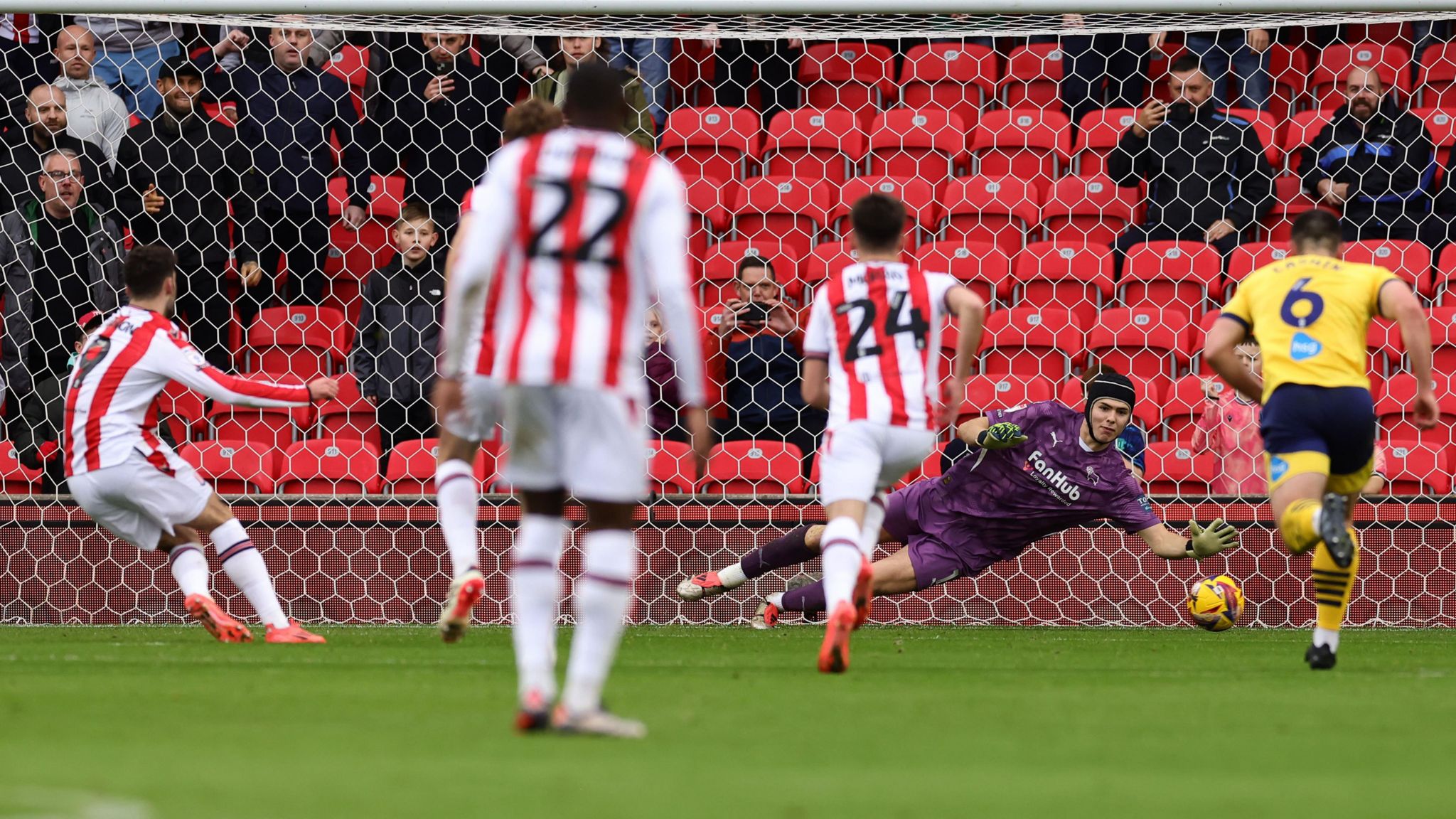 Tom Cannon scores his second penalty in Stoke colours