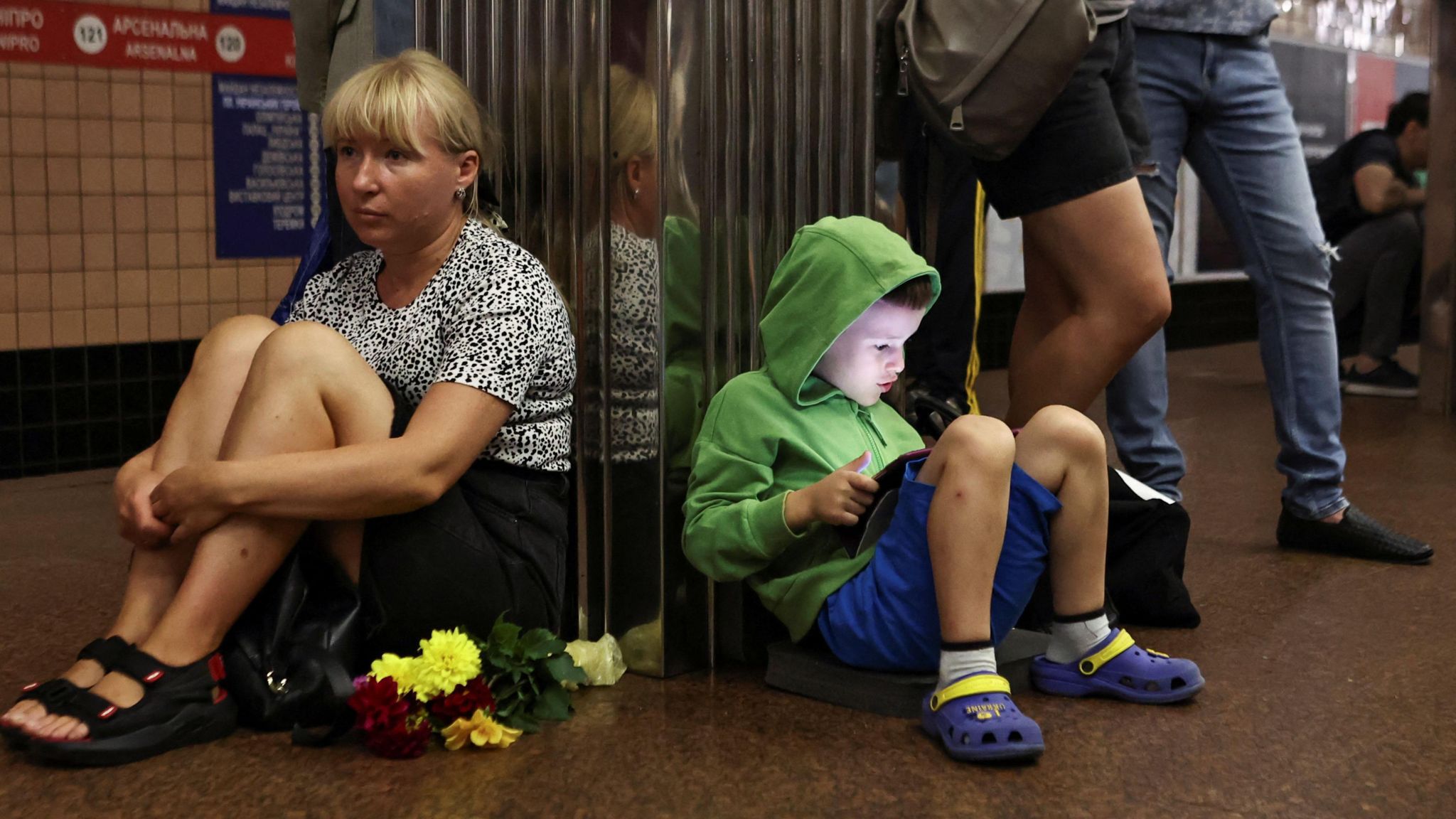 People shelter in a metro station in Kyiv during the barrage 