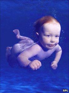 Baby swimming underwater