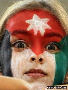 Girl with Jordan flag facepaint