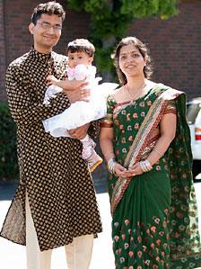 Nidhi Agarwal with her husband and daughter