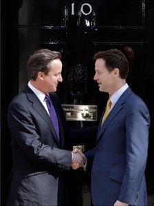 Nick Clegg and David Cameron shake hands outside 10 Downing Street