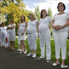 Pregnant women at a protest calling for better benefits for mothers worldwide, Breda, Netherlands, 4 September
