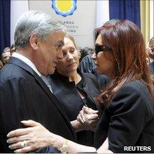 Chilean president Sebastian Pinera consoling Cristina Fernandez, Buenos Aires