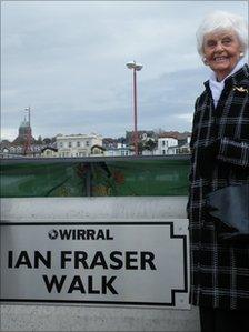 Melba Fraser with the new sign
