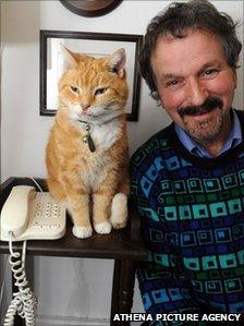 Howard Moss with his cat Ginger