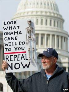 A man protests against the healthcare legislation in Washington (Nov 2010)