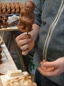 A 'caganer' figurine fresh from a mold in the workshop near Barcelona, December 2010