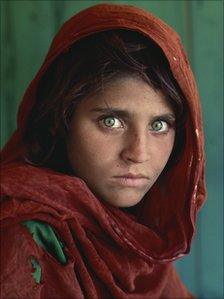 Sharbat Gula, Afghan Girl, at Nasir Bagh refugee camp near Peshawar, Pakistan, 1984.