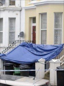 A tarpaulin outside a property in Ceylon Place, Eastbourne