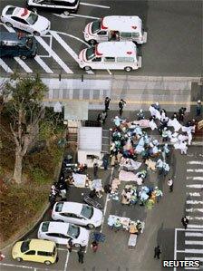 Emergency services treat those injured by the quake