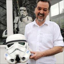 Andrew Ainsworth with a Stormtrooper helmet