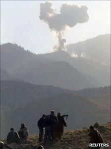 Smoke rises from the Tora Bora mountains after a US air strike (15 December 2001)