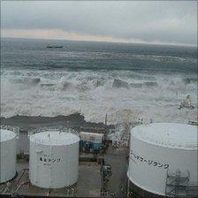 Tsunami breaching the power plant's defences (Image: TEPCO)