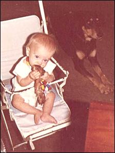 Toby the dog waits patiently while Robert finishes gnawing his bone in Ukiriguru