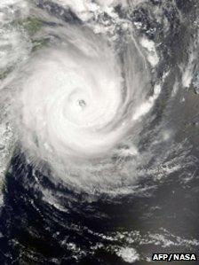 An image released by the Nasa Earth Observatory and taken on 13 February 2012 of Tropical Cyclone Giovanna located about 250 nautical miles (465km) east of Antananarivo, Madagascar