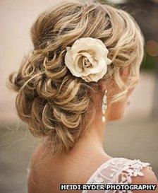 A wedding-day hairstyle by Charmed Beauty hair salon in California