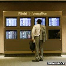 Man looking at flight information