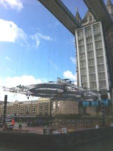 Olympic rings going up on Tower Bridge