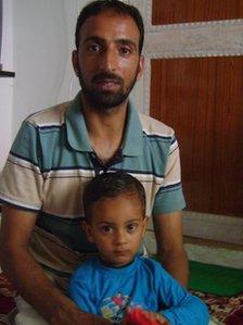 Naseer Ahmad with one of his sons