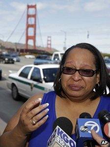 Toll-taker Jacquie Dean talks to reporters about her last day on the job at the Golden Gate Bridge on Tuesday