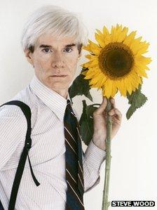 Andy Warhol with sunflower