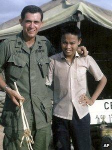 Dr Sam Axelrad, left, with Nguyen Quang Hung in October 1966 in front of his military clinic in the former South Vietnam