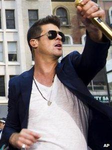 Robin Thicke, performing Blurred Lines in New York