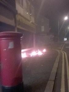 Burning petrol on street
