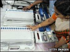 Woman testing electric voting machine