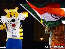 Shera, mascot of the 2010 Commonwealth Games, and Indian flag