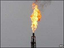 Flame erupts from an oil refinery in Iran
