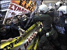 Protestors clash with riot policemen in front of the Greek finance ministry - 29 April