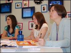O2 employees, Negin Sabet, Emma Howard and Natalie Warner, sit in a Spanish class