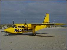 A Hebridean Airways plane on a beach