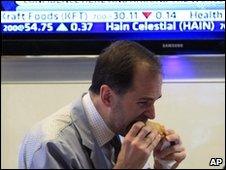 Trader eating lunch at NYSE