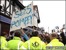 Portsmouth fans protest as the club goes into administration