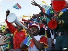 Fans watching an England practice game in South Africa