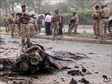 The site of a car bomb in Baghdad