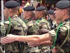 Soldiers from a French contingent parade on 4 April 2010 in Dakar as Senegal marked 50 years of independence