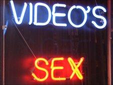Neon sign outside sex shop, BBC
