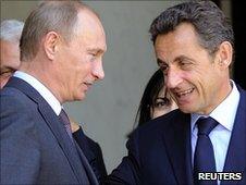 Vladimir Putin and Nicolas Sarkozy