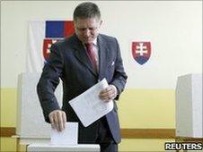Slovak Prime Minister Robert Fico casts his vote in the general election in Bratislava. Slovakia