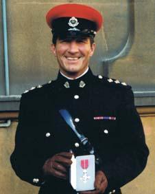 Bill Shaw with his MBE medal