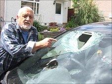 Kenneth Hendy with his damaged car
