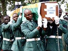 Soldiers carry coffins during the burial in Abuja, Nigeria, of the soldiers killed in an African Union peacekeeping mission in Darfur on 29 September 2007