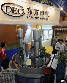 A Chinese energy company displays a model of a nuclear reactor at a show in Vietnam